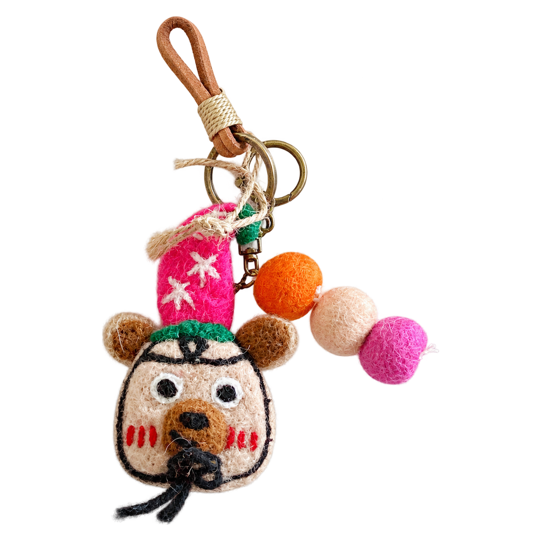 Starry Hat Bear, felt bag charm on a bronze-coloured clip with a cord loop